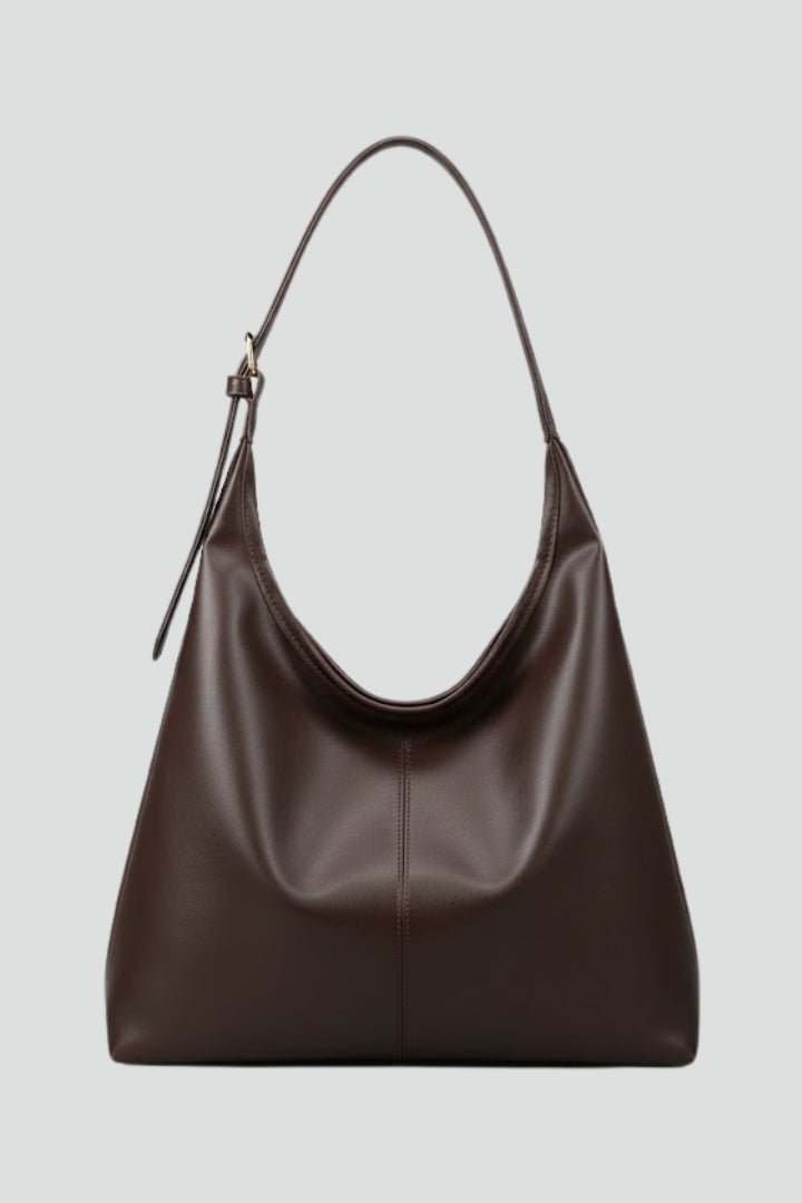 Spacious Women's Everyday Carryall Handbag in classic black. Elegant and versatile shoulder bag with organized compartments.