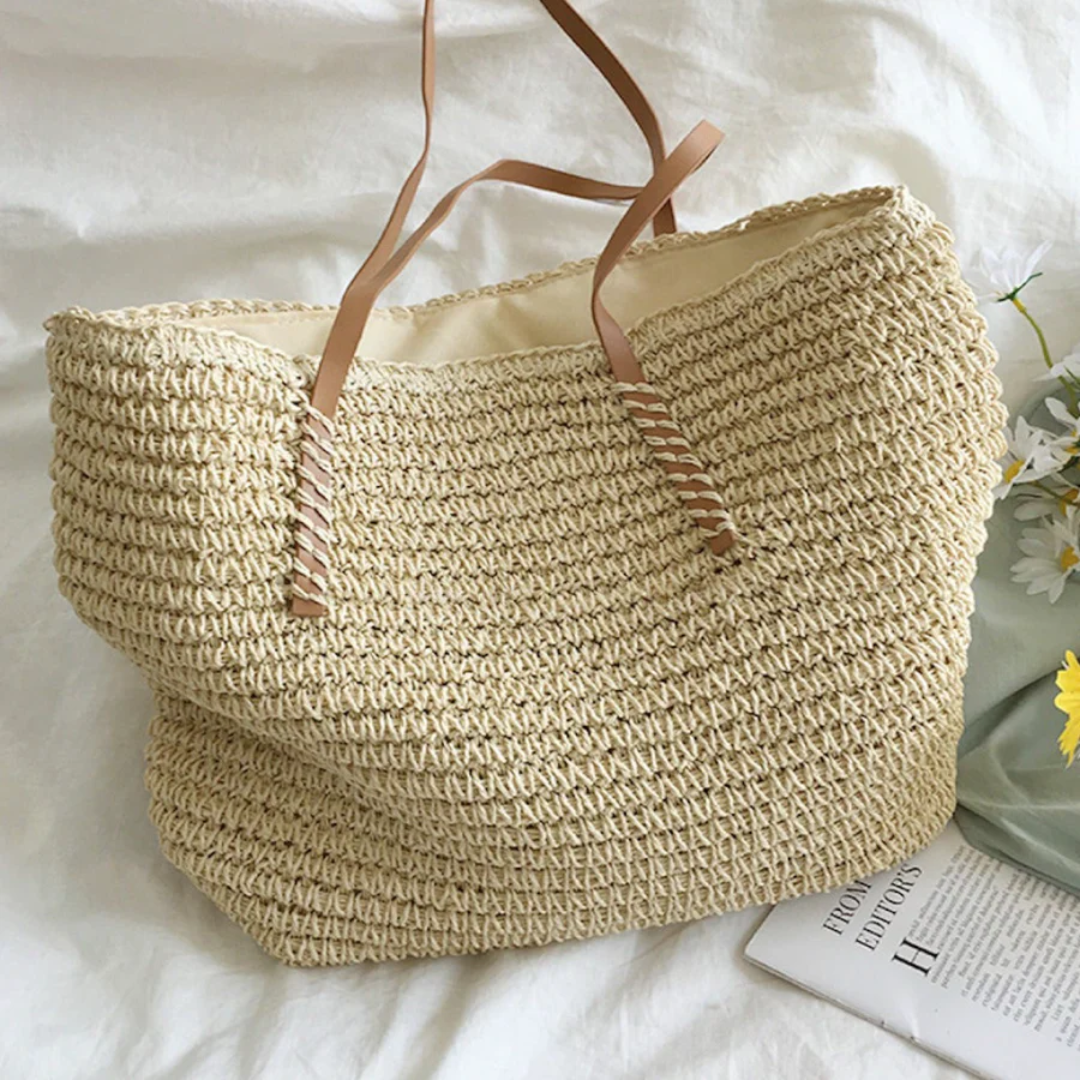 Modern classic brown TerraWoven handbag for women, offering spacious storage and a sturdy shoulder strap.