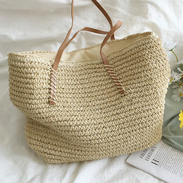 Modern classic brown TerraWoven handbag for women, offering spacious storage and a sturdy shoulder strap.