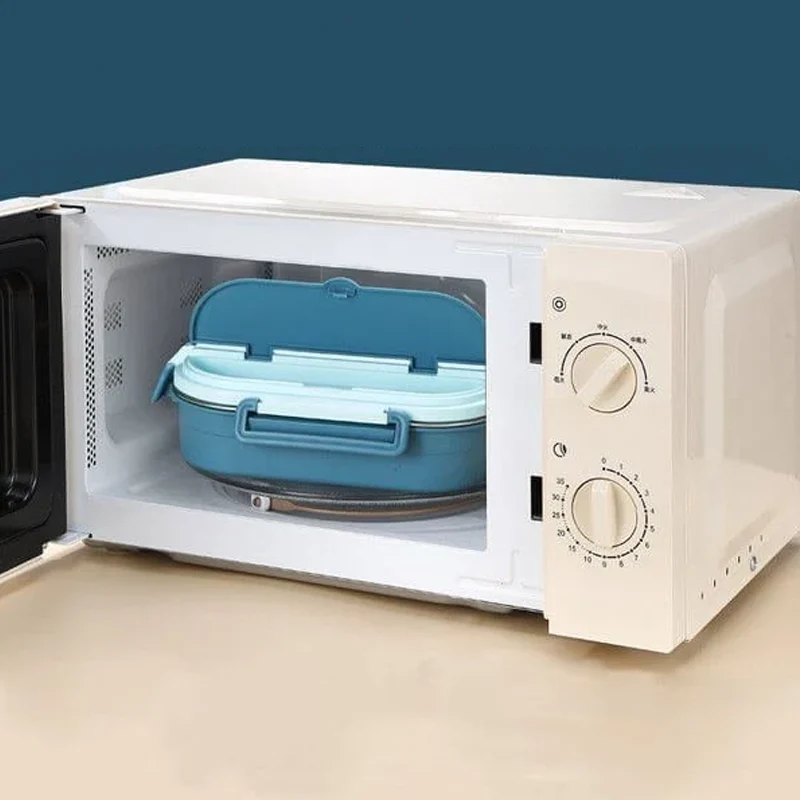 Compact 4-compartment thermal bento box, stainless steel, keeps your lunch warm.