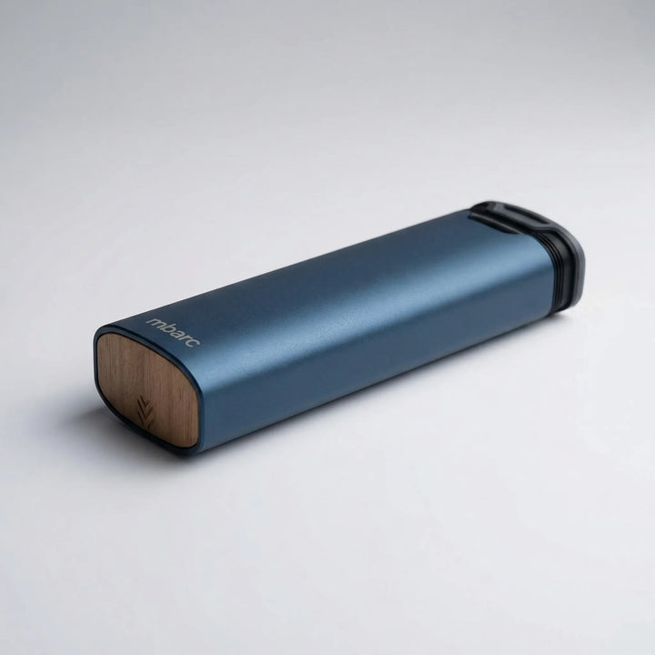 Portable 7-day pill box organizer, featuring elegant aluminum & wood. Ideal for weekly travel supplements.