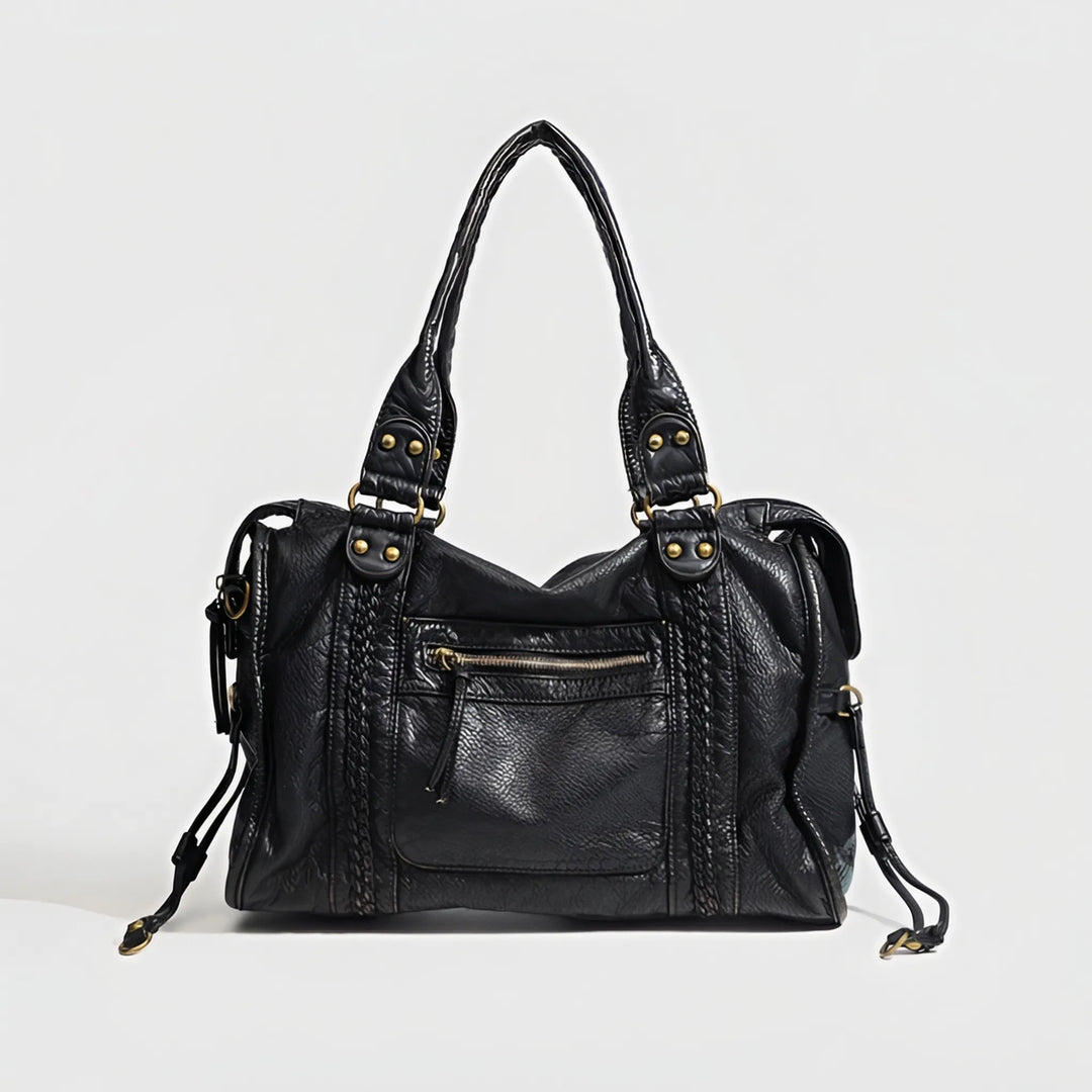 Elegant black women's shoulder bag, a chic everyday handbag. Features a sleek design for carrying daily essentials.