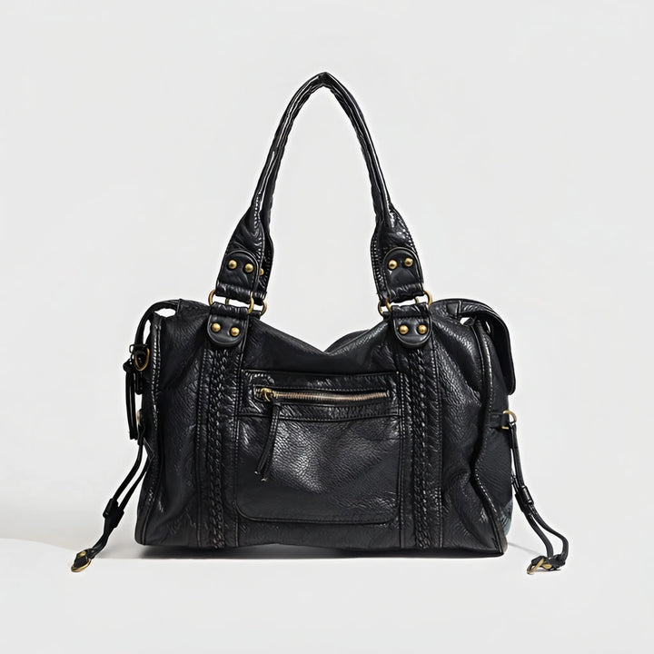 Elegant black women's shoulder bag, a chic everyday handbag. Features a sleek design for carrying daily essentials.