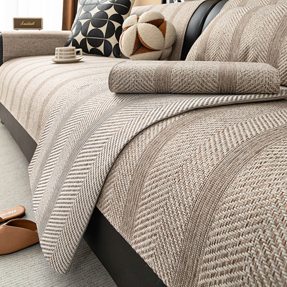 Stylish herringbone linen blend sofa protector; durable, pet-friendly & washable couch cover for living room.