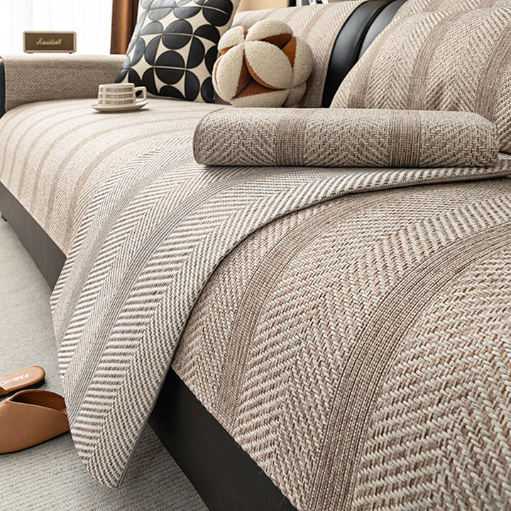Stylish herringbone linen blend sofa protector; durable, pet-friendly & washable couch cover for living room.