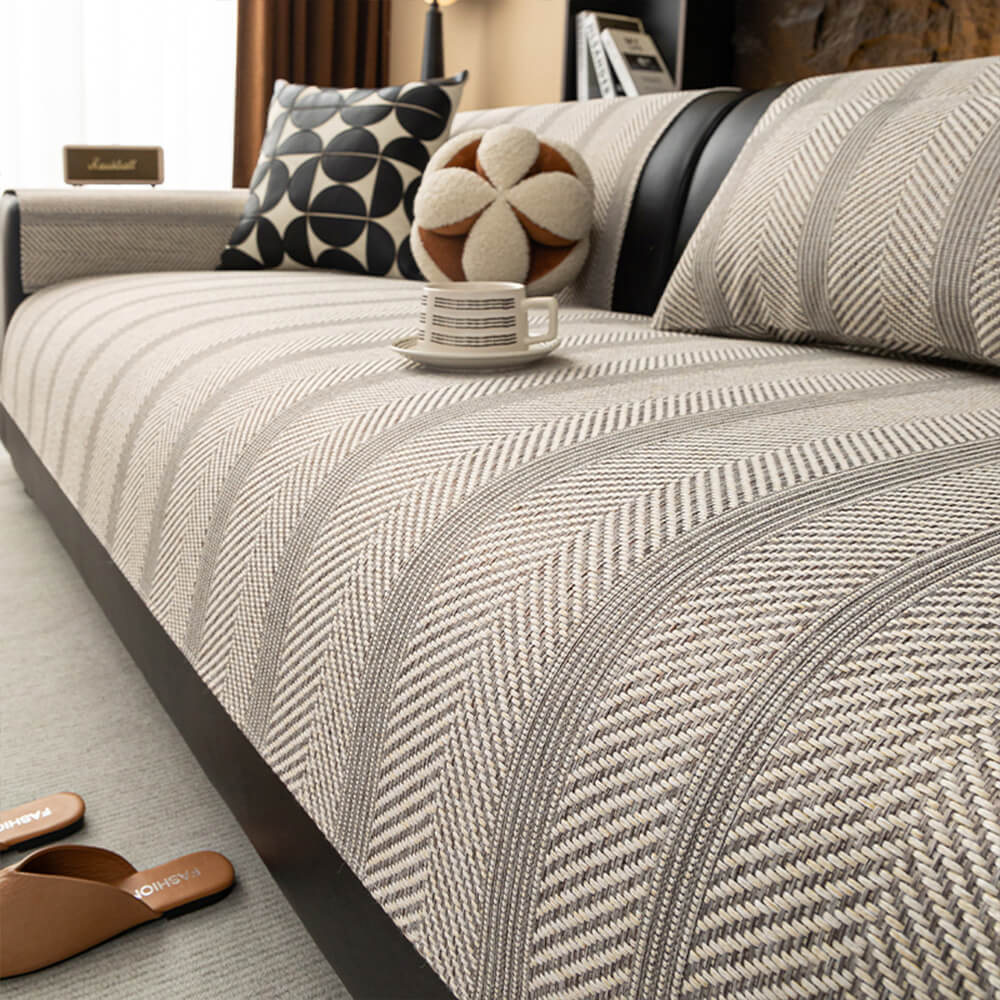Pet-friendly, cat scratch resistant herringbone linen blend couch cover; washable, non-slip sofa protector.