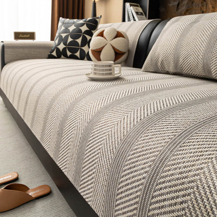 Pet-friendly, cat scratch resistant herringbone linen blend couch cover; washable, non-slip sofa protector.