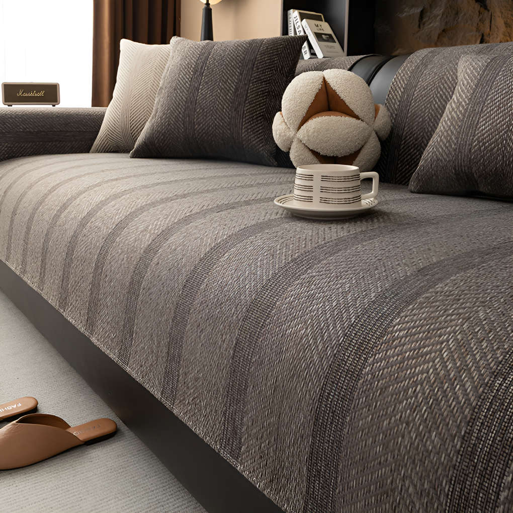 Washable non-slip sofa protector; durable, pet-friendly herringbone linen blend couch cover for stylish living rooms.
