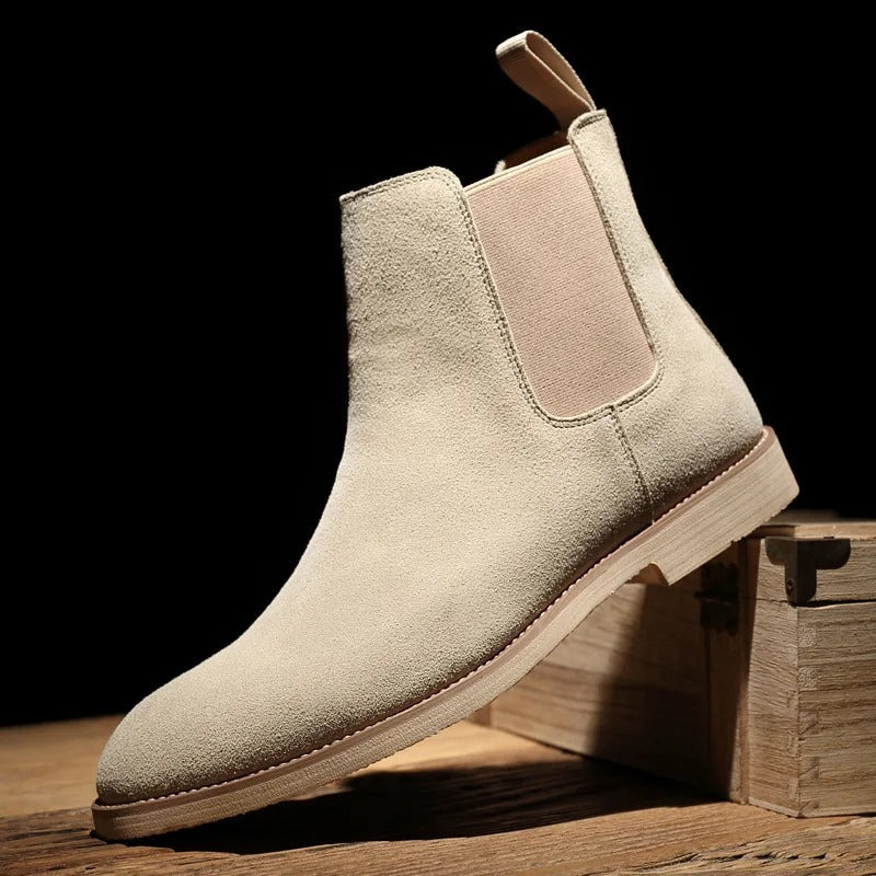 Classic men's leather Chelsea boots, stylish slip-on footwear for everyday comfort and versatile use.
