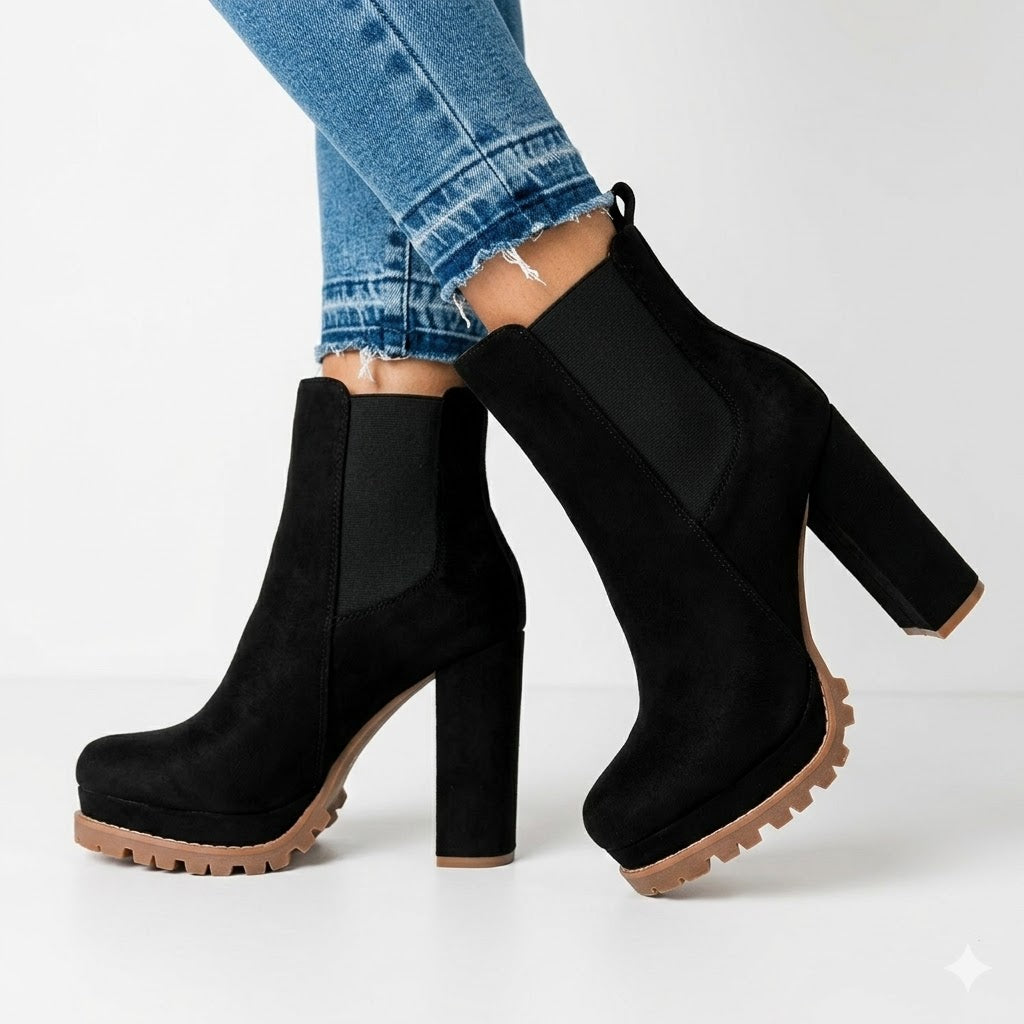 Stylish women's ankle boots with a platform sole and sturdy block heel, perfect for fall & winter chic.