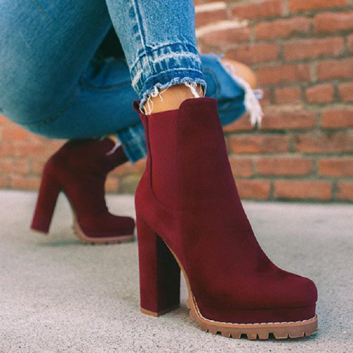 Versatile women's platform ankle boots with a chic block heel, perfect for stylish casual or evening looks.