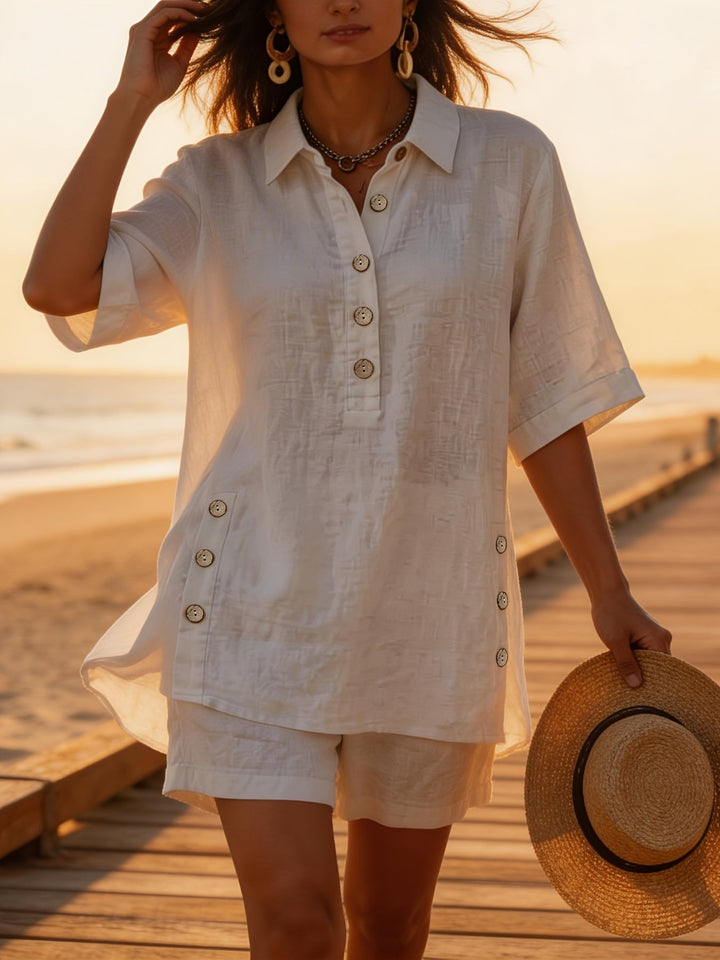Relaxed fit women's two-piece set: collared button-up top and shorts, ideal for travel or casual wear.