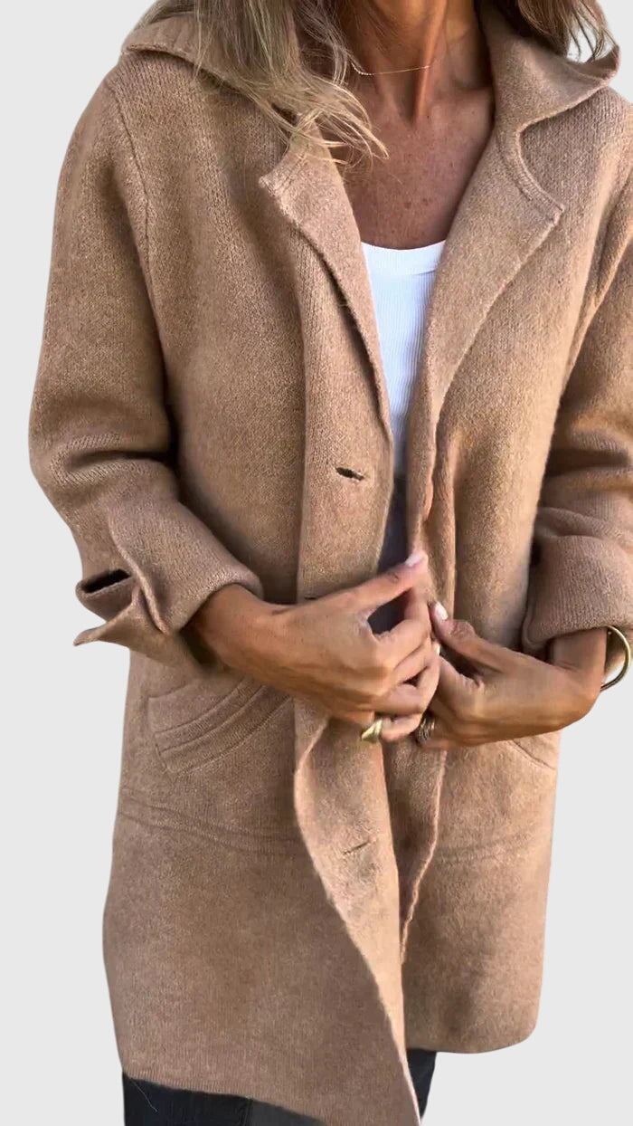 Detail of the stylish lapel on a women's cozy longline blazer, perfect for chic fashion.