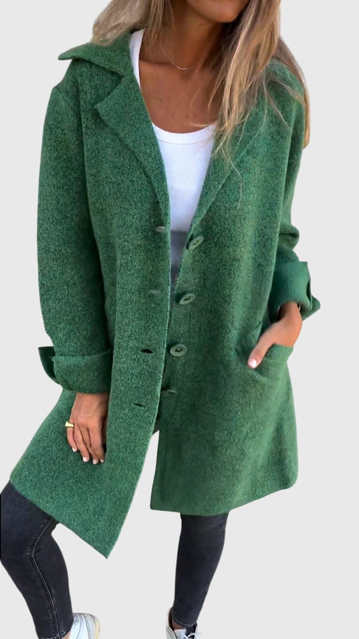 Women's relaxed longline blazer styled casually. Perfect cozy outerwear for everyday fashion.