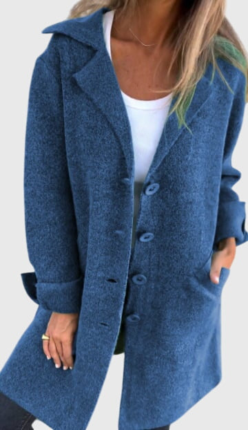 Back of a women's cozy longline blazer, showcasing its relaxed fit & chic silhouette for outerwear.
