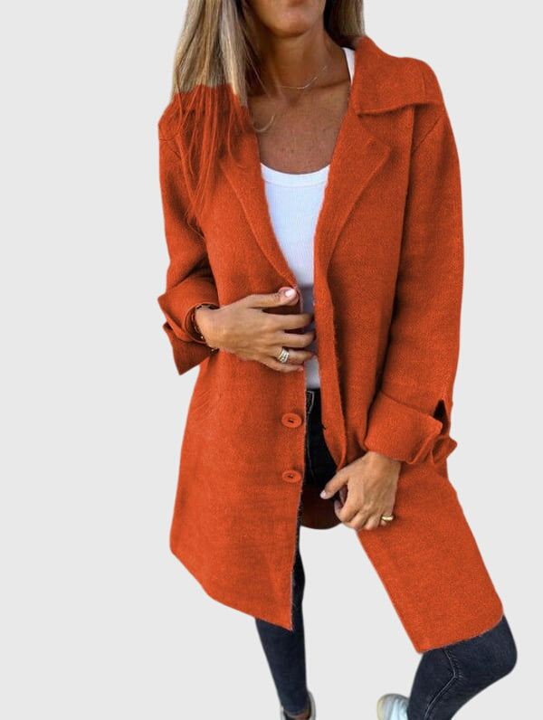 Dynamic shot of a women's versatile longline blazer, highlighting its comfortable movement & stylish design.
