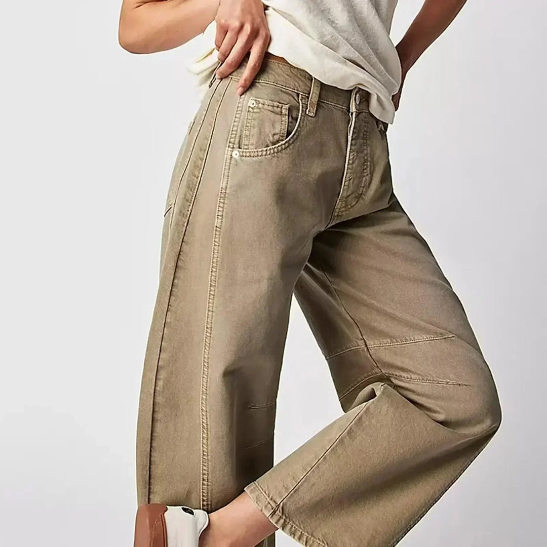Model in versatile women's high waist wide leg jeans, showcasing effortless style and all-day comfort. Casual look.