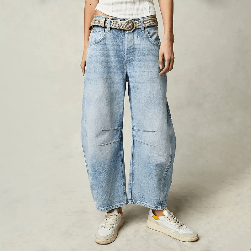 Full-length view of women's high waist wide leg jeans, showing the elegant flow and relaxed fit for versatile style.