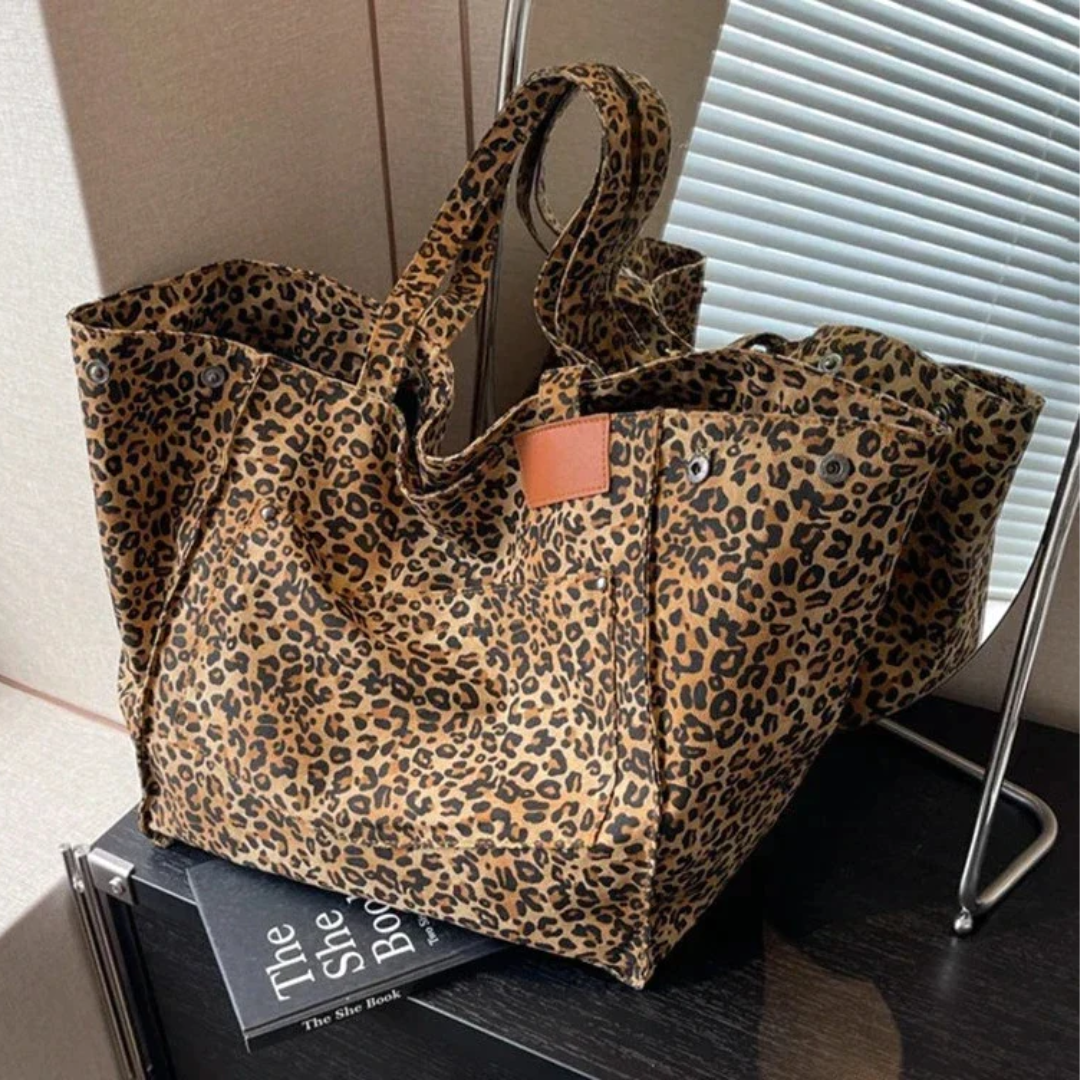 Spacious women's leopard print tote bag, durable faux leather handbag for all your essentials.