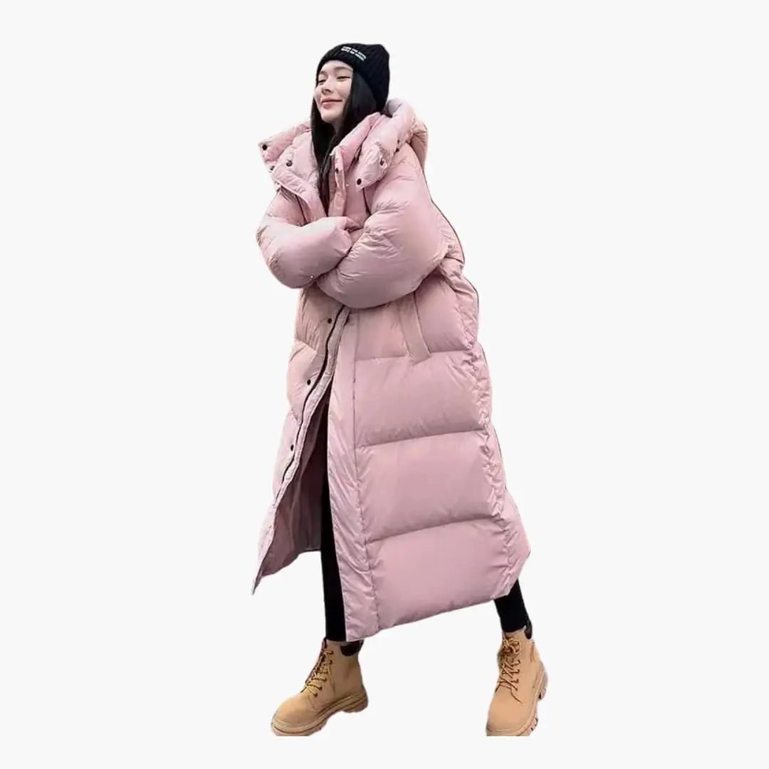 Stylish women's long puffer jacket with a cozy hood, perfect for staying warm in cold winter weather and fall fashion.