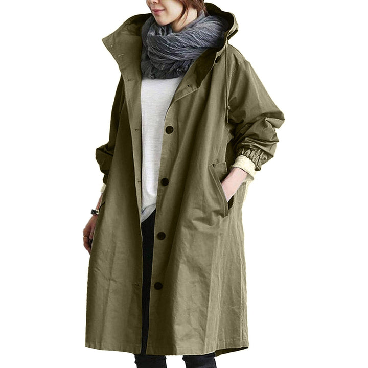 Stylish women's long waterproof trench coat, perfect for all-weather protection and outdoor wear.