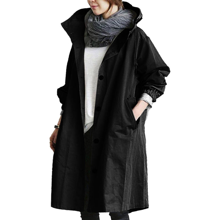 Protective women's long waterproof raincoat, ideal for casual outdoor adventures and wet weather.
