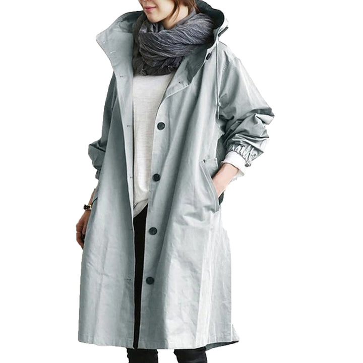 Women's long waterproof trench coat, offering stylish protection for all-weather and outdoor wear.