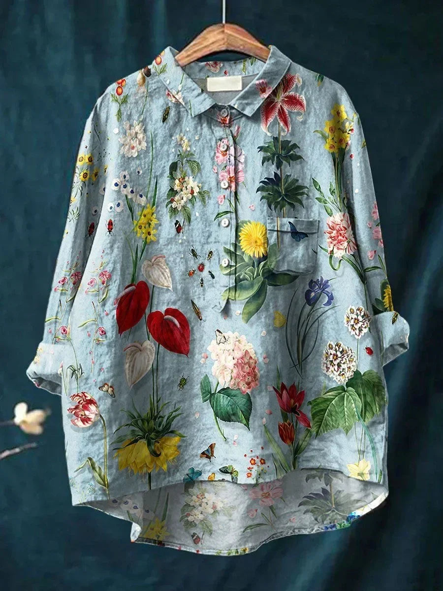 Stylish women's loose fit floral blouse with vibrant print, perfect for summer casual or elegant everyday wear.
