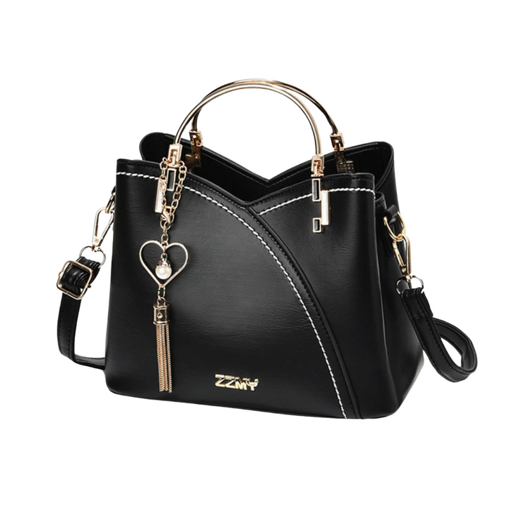 Chic Women's Patchwork Tote Bag, a versatile shoulder handbag with elegant tassel charm for daily use.