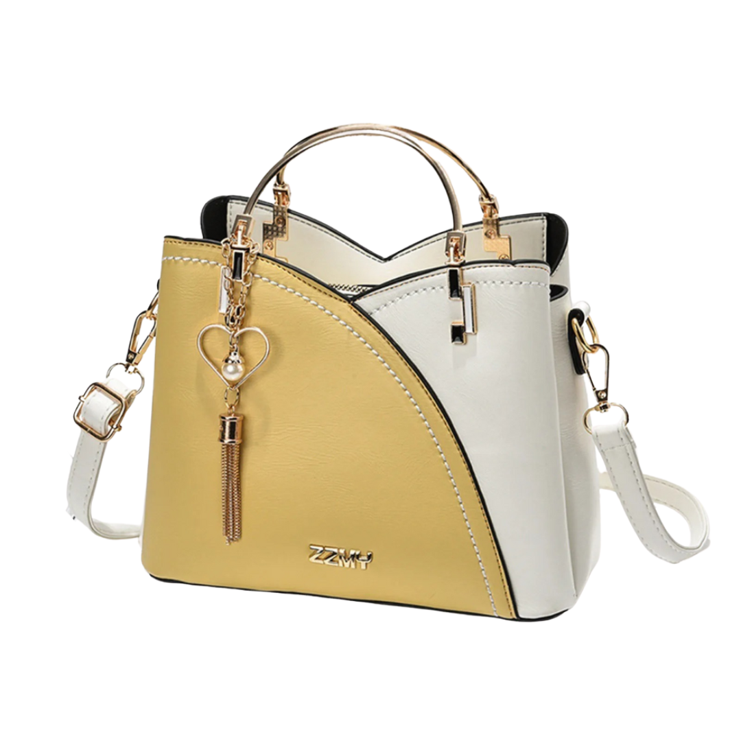 Women's Patchwork Tote Bag: a unique fashion accessory with a stylish tassel charm. Perfect chic shoulder handbag.
