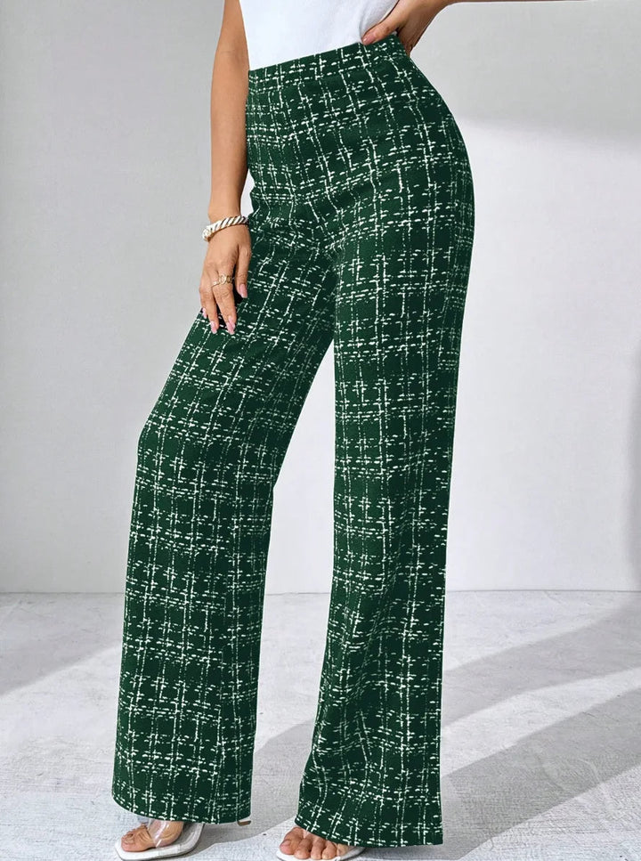 Comfortable women's high-waisted plaid flare pants made from a soft, stretchy knit.