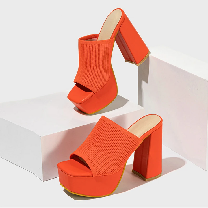 Stylish women's platform sandals, elevated & comfortable for trendy summer fashion.