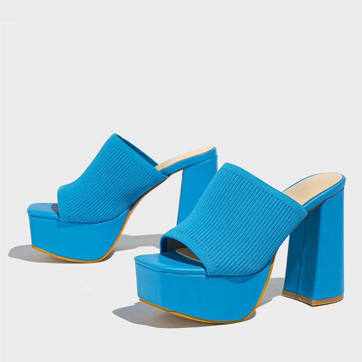 Elevated women's platform sandals, designed for stylish comfort & chic summer fashion.