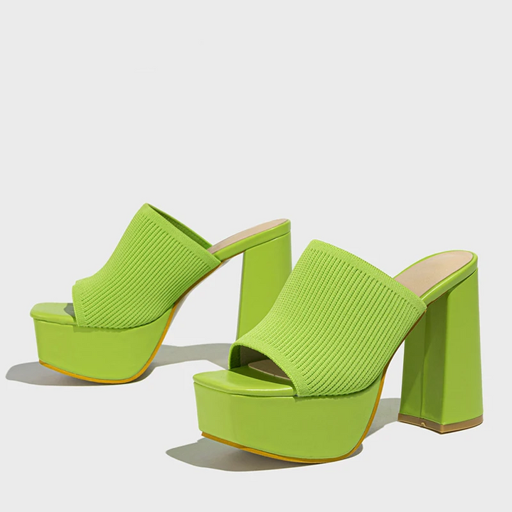 Chic open-toe women's platform sandals, providing comfortable height for trendy summer looks.