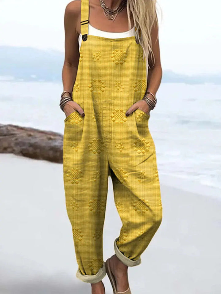 Easy care women's relaxed pattern jumpsuit, offering comfortable, stylish wide-leg fashion for daily wear.
