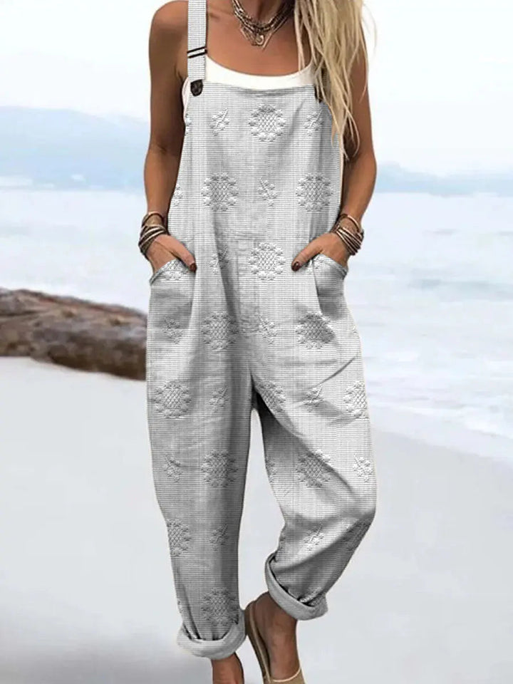 Full-length women's relaxed pattern jumpsuit, providing ultimate comfort and a stylish wide-leg silhouette.