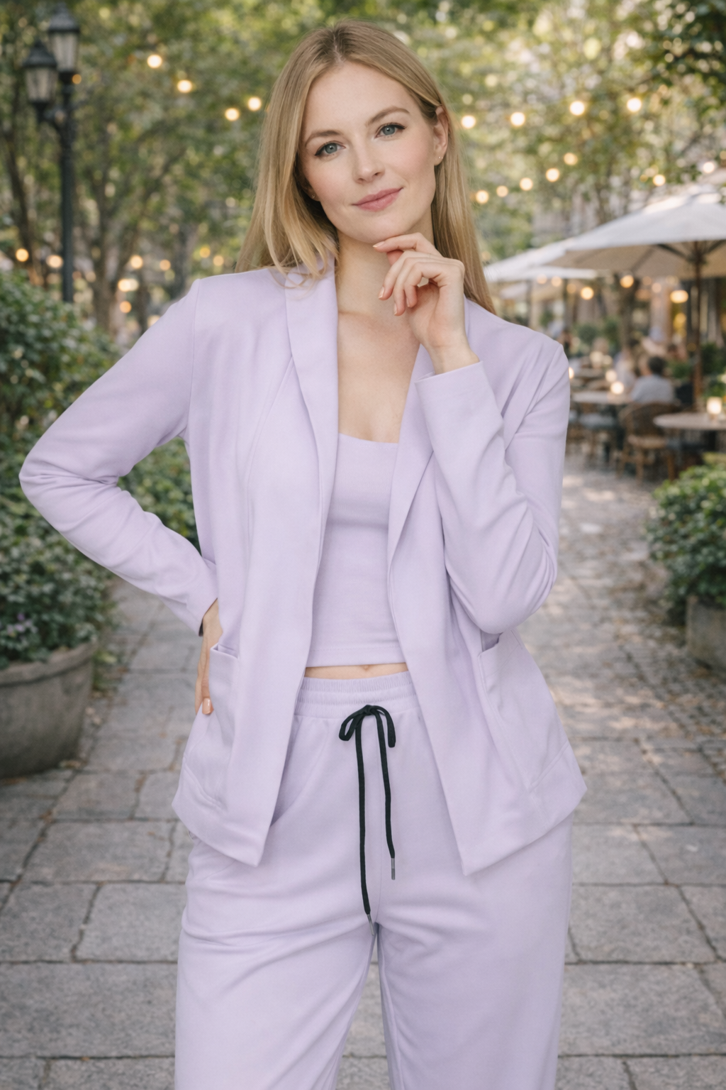 Effortless women's two-piece suit featuring a chic blazer and comfortable pants, ideal for professional or casual style.