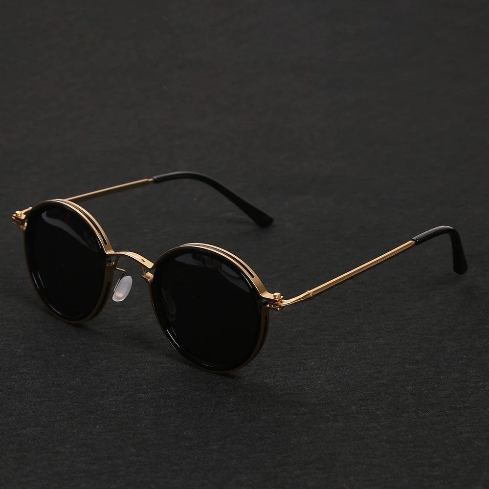 Timeless unisex round polarized sunglasses featuring chic gold metal temples for UV eye protection.