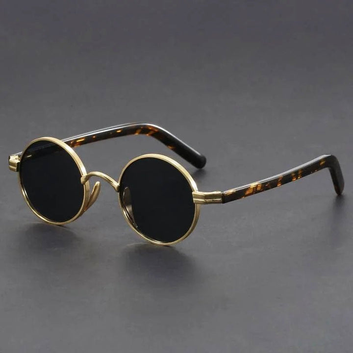 Unisex retro round sunglasses with metal frame & UV400 protection. Stylish vintage eyewear accessory.