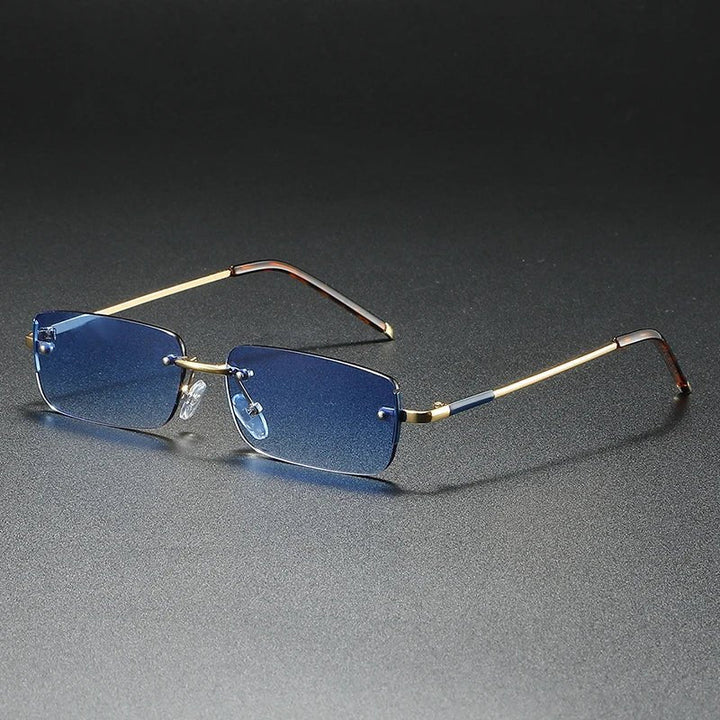 Stylish unisex rimless rectangular sunglasses with sophisticated gold details & attractive gradient lenses. UV protection.