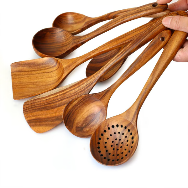 "Teak wood kitchen utensils set, eco-friendly and non-toxic, showcasing natural grain, perfect for sustainable cooking."