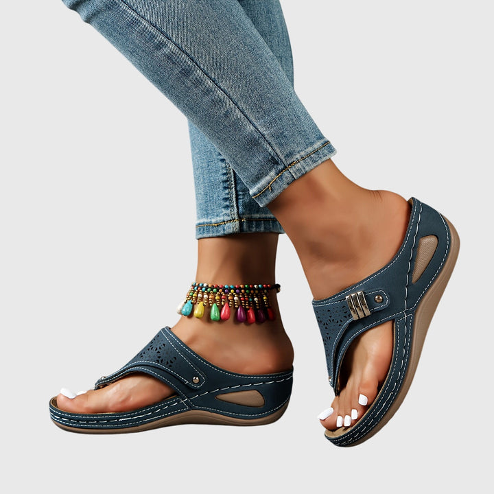 Theodoros women's platform sandals with an open toe design, breathable perforated detail, ideal for summer.