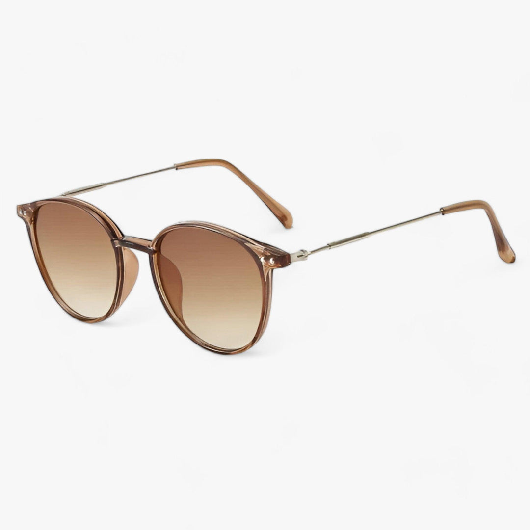 Stylish black round frame women's sunglasses offering UV protection. A timeless luxury retro eyewear for summer essentials.