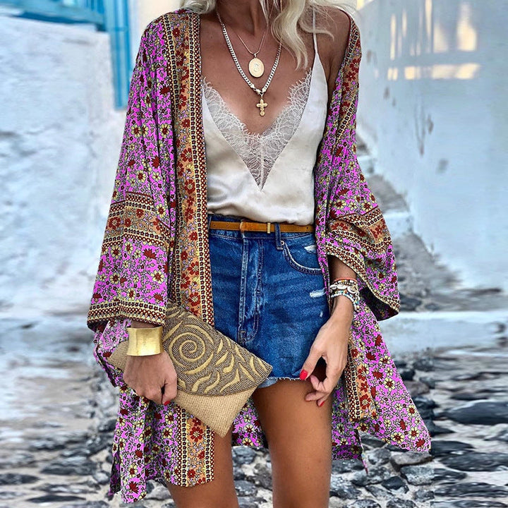 Boho style women's long sleeve cardigan jacket with a vibrant ethnic pattern, offering a comfortable loose fit.