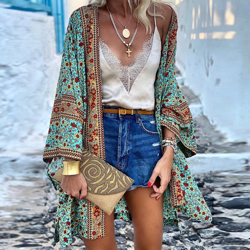 Vibrant women's boho patterned cardigan. Loose fit, long sleeve casual wear with a unique ethnic print for trendy layering.