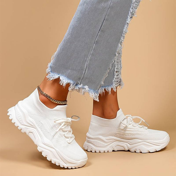 Comfortable women's casual walking shoes with a trendy lace-up design and stylish chunky sole.
