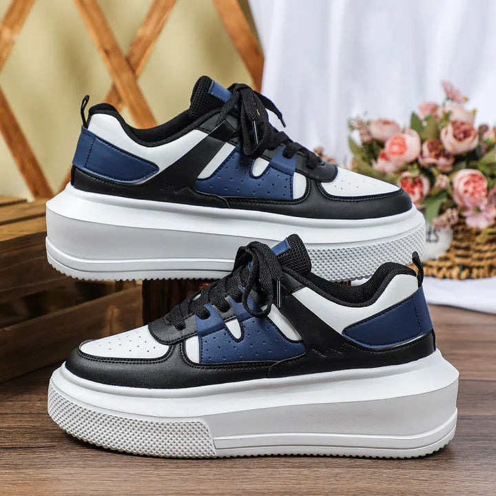 Athletic casual women's platform sneakers, featuring perforated panels and secure lace-up for active style.