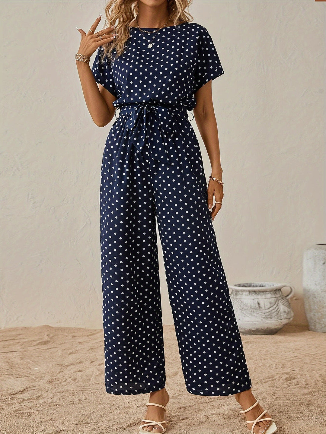 Trendy women's polka dot jumpsuit with elastic waist, perfect for summer casual wear & vacation outfits.