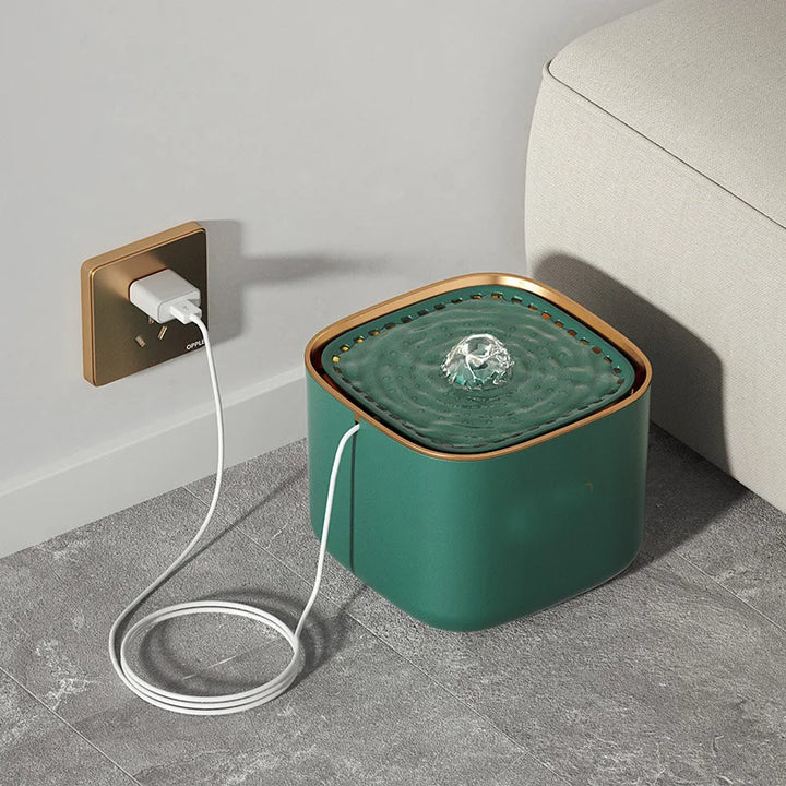 Filtered, fresh water from an automatic pet fountain (12.7 cup) for optimal cat & dog hydration. Quiet design.