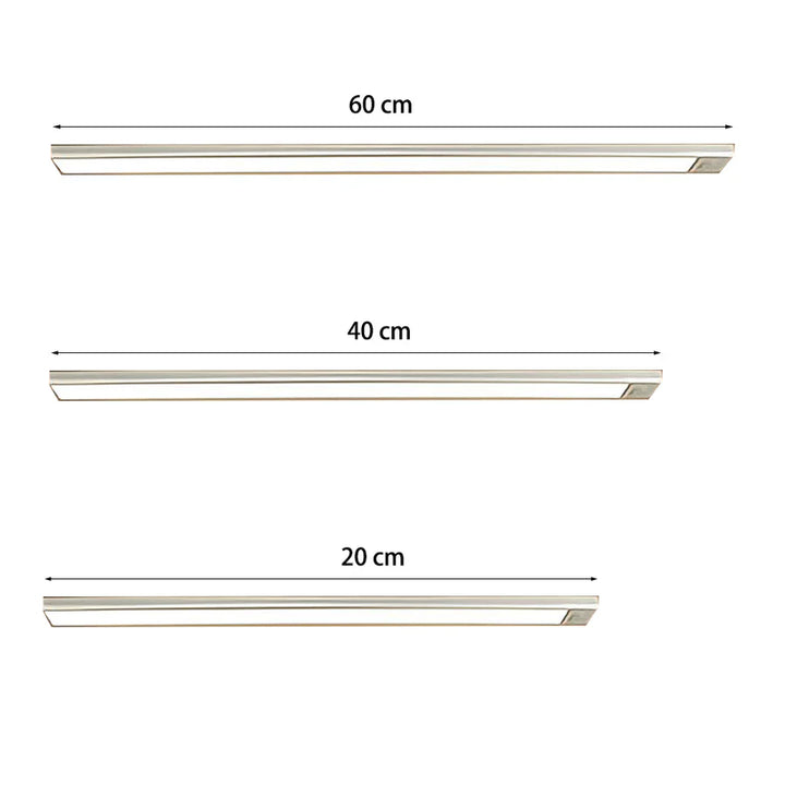 Ultra-slim motion sensor cabinet light in sleek aluminum, black or silver, 9mm thick, 20-60cm, versatile, hands-free.
